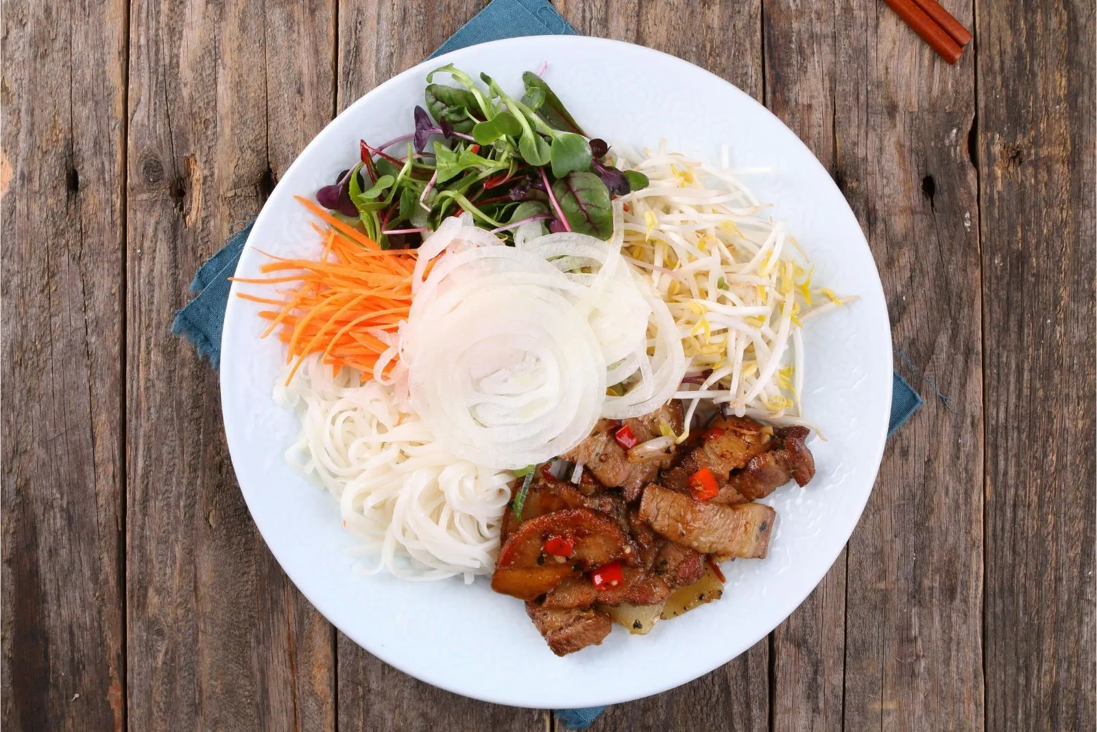 Grilled pork vermicelli bowl with veggies at Phorainbow, a Vietnamese Restaurant in Brooklyn
