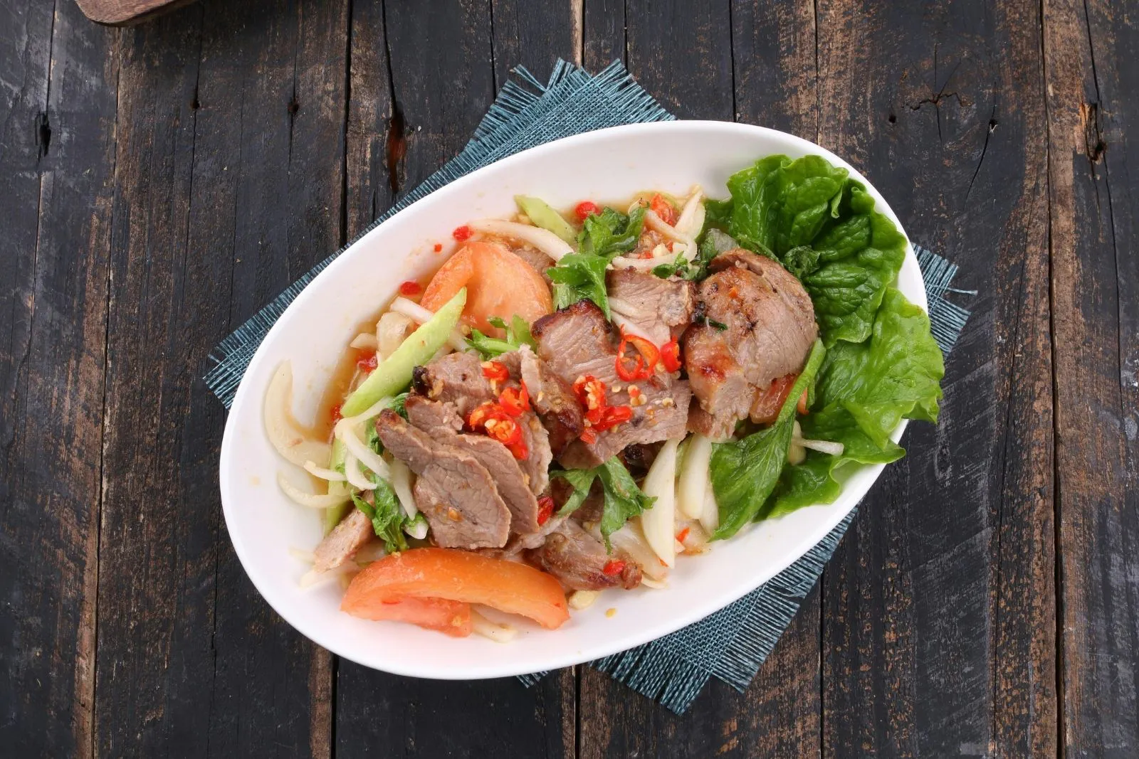 Spicy beef salad with fresh herbs at Phorainbow, a Vietnamese Restaurant in Brooklyn